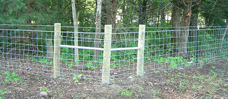 field fence with wood post
